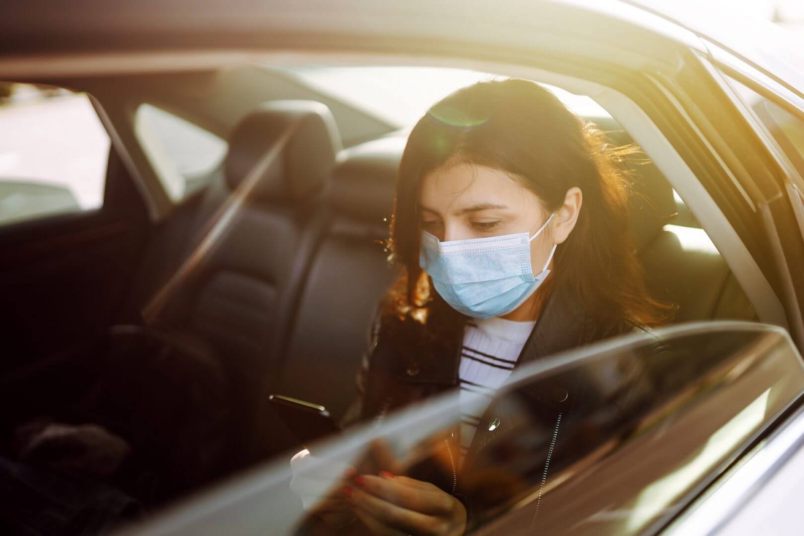 Taxi passenger in a Covid19 mask Taxi passenger in a Covid19 mask